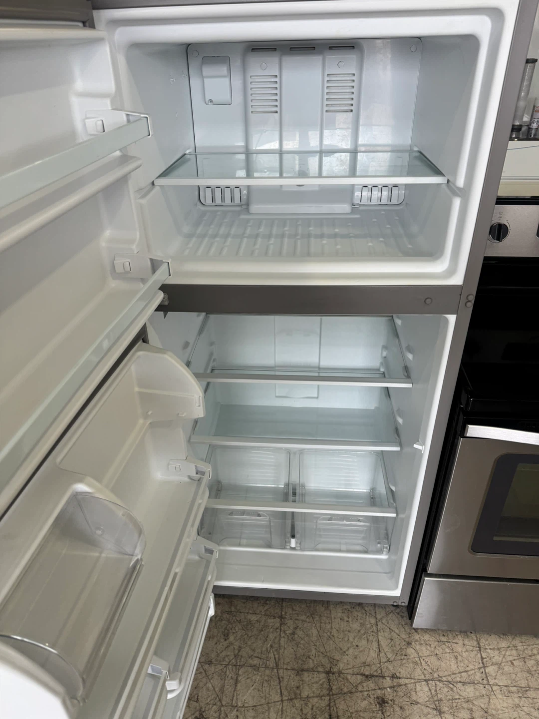 Whirlpool 30”Stainless Steel Refrigerator and stove - photo 3