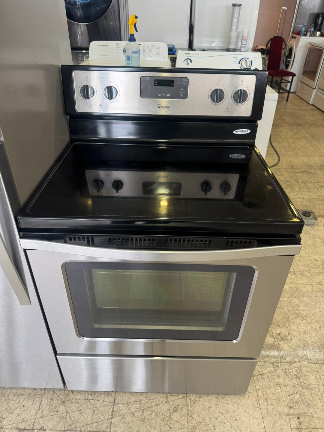 Whirlpool 30”Stainless Steel Refrigerator and stove - photo 5