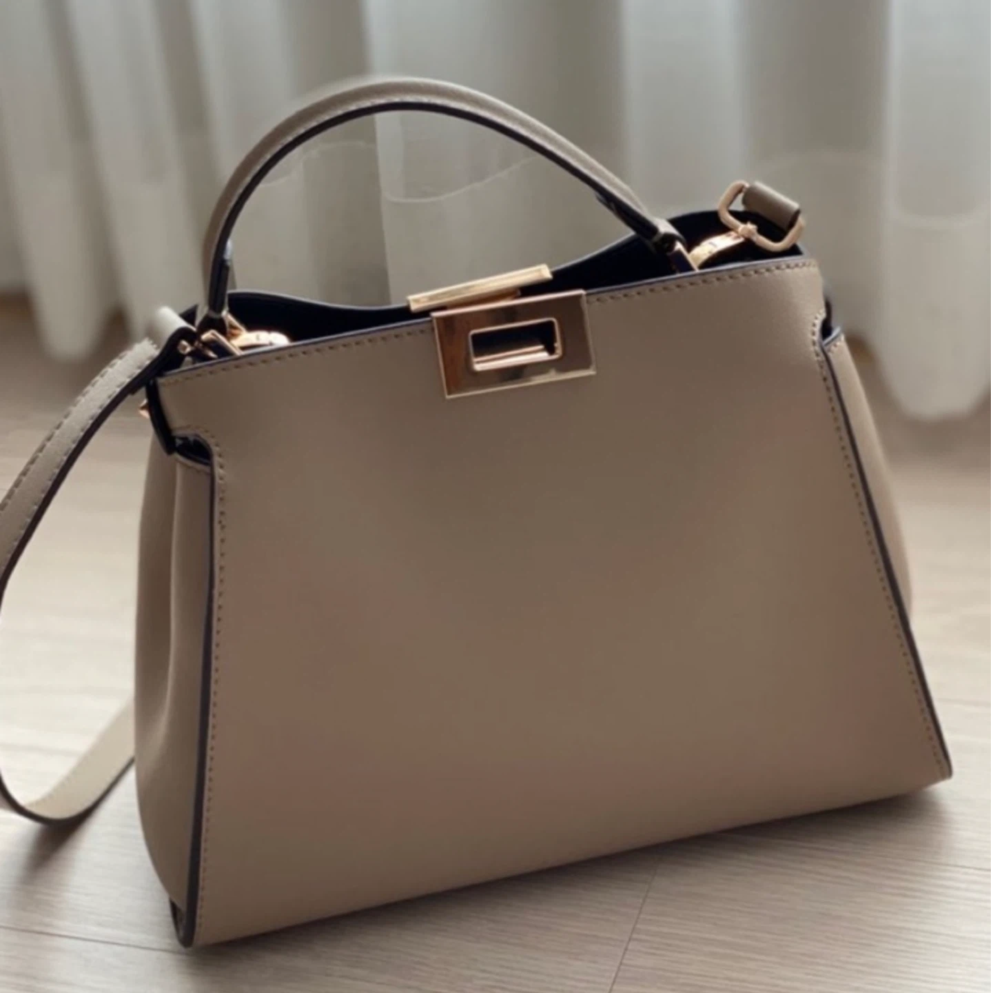 Beige genuine leather handbag with strap