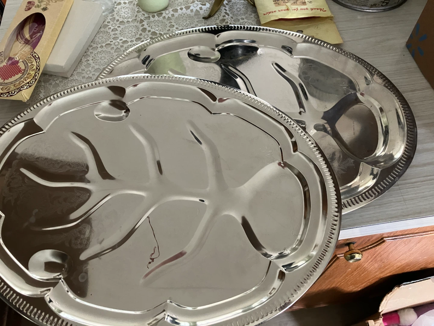 Two Silver-Tone Decorative Serving Trays