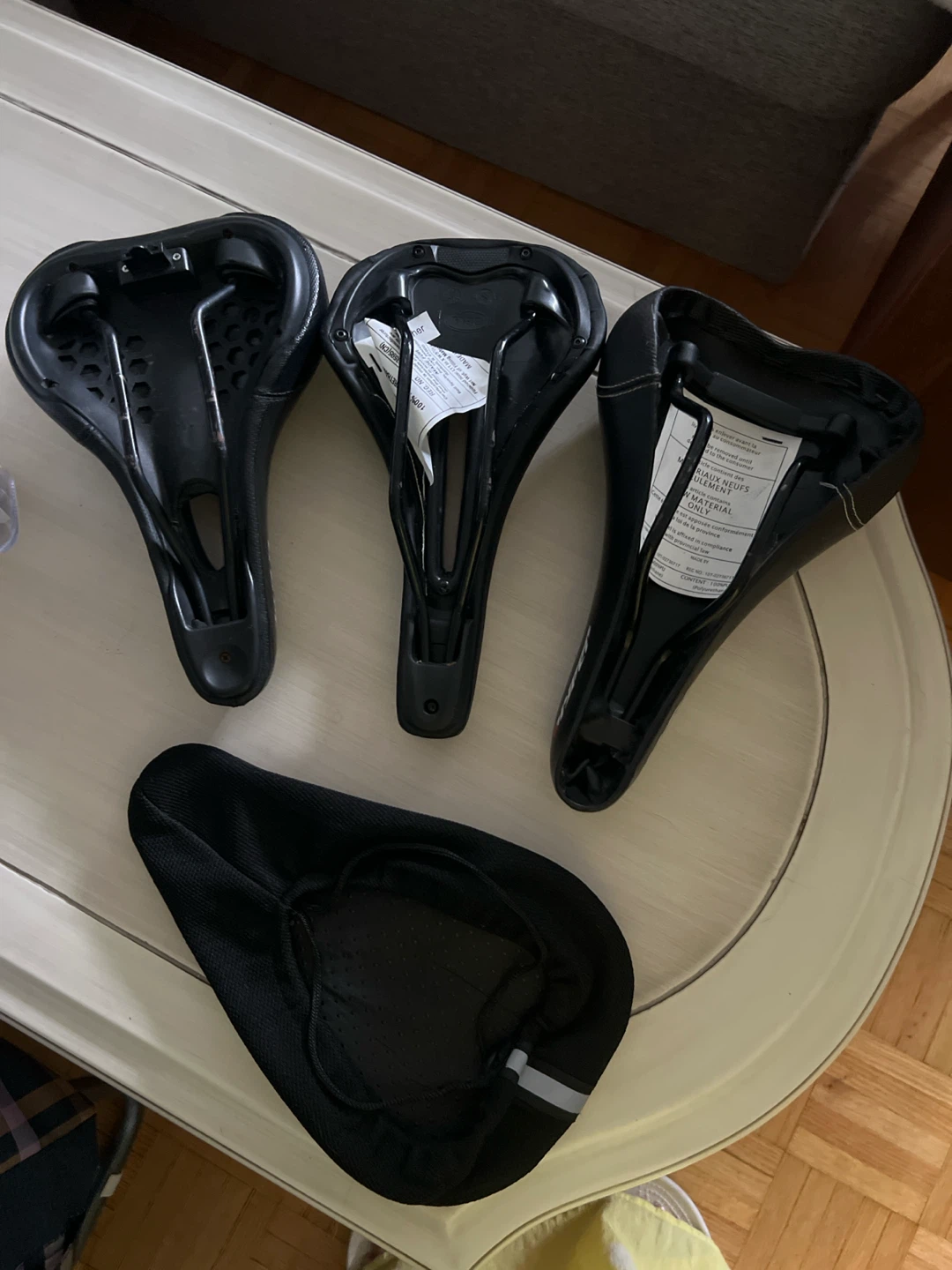 Three Bicycle Saddles and One Gel Seat Cover