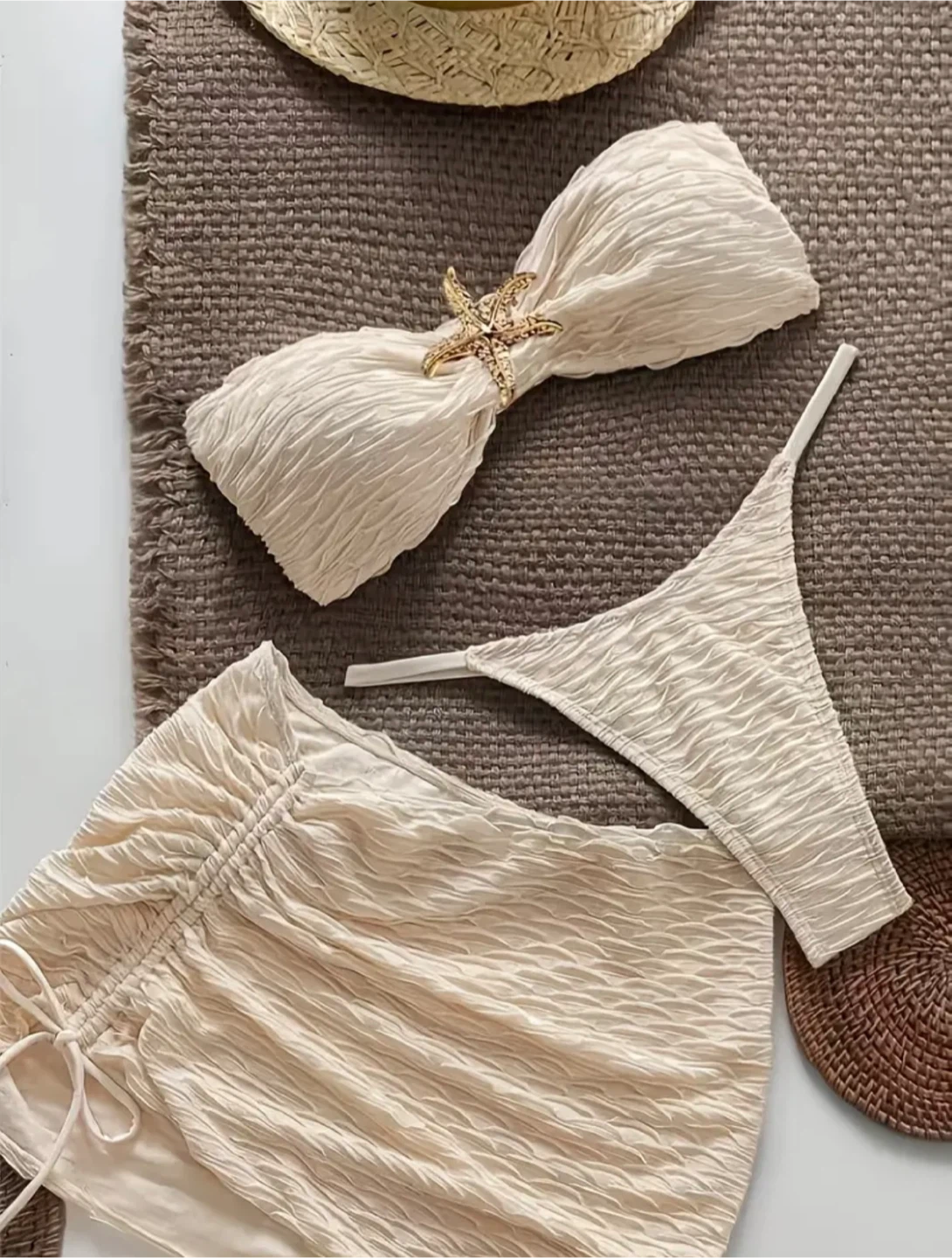 Cream textured bikini and cover-up skirt set