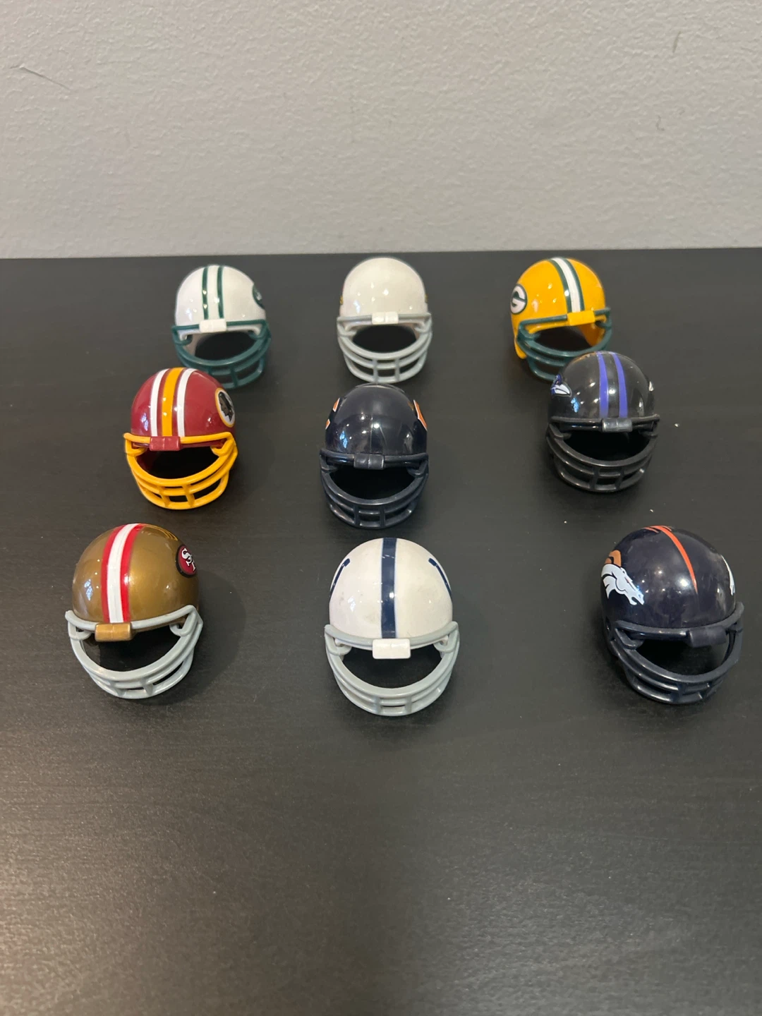 Set of 9 NFL Mini Helmets