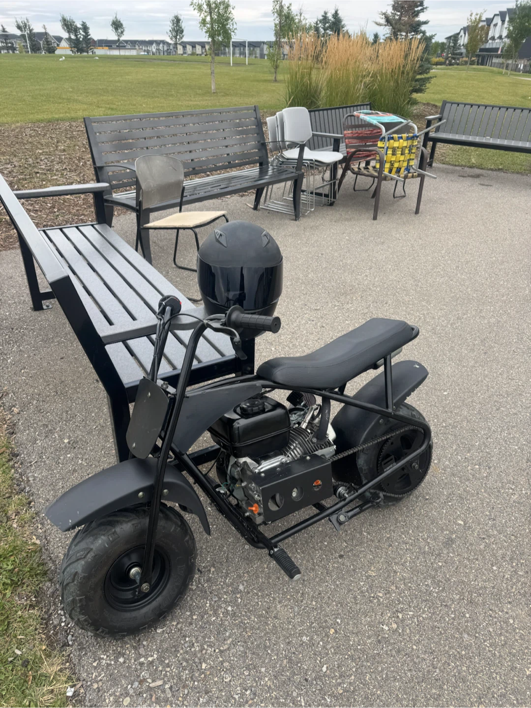 Mini bike with black helmet