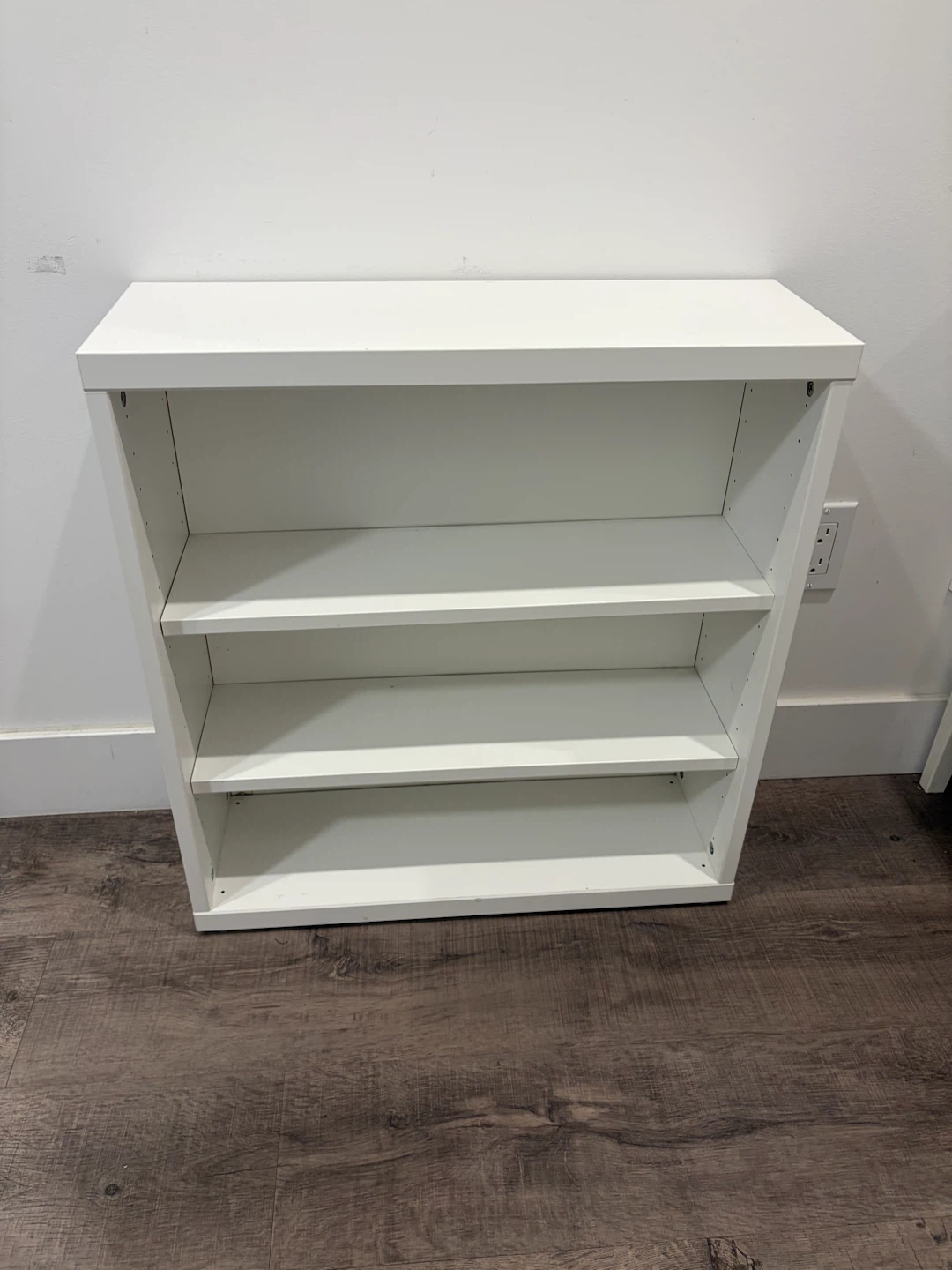 White shelf with boards