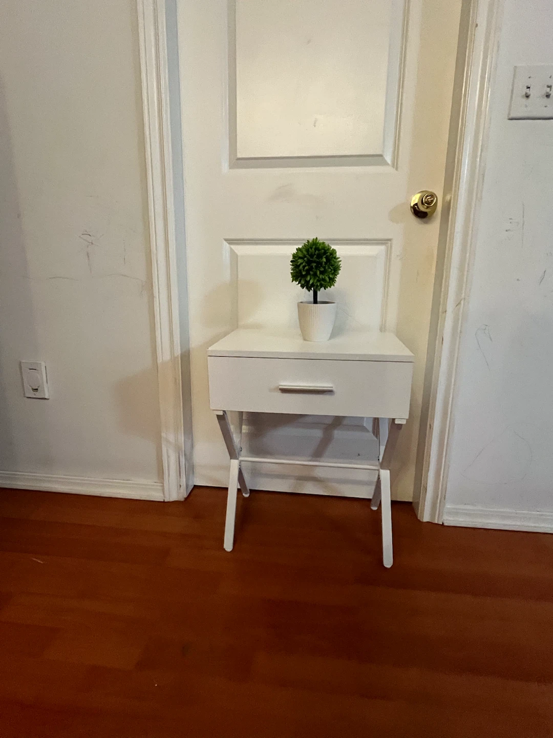 White bedside table