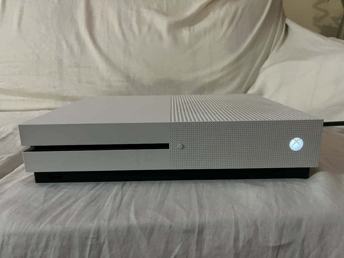 Xbox One S Console with a game and Controller & charging dock