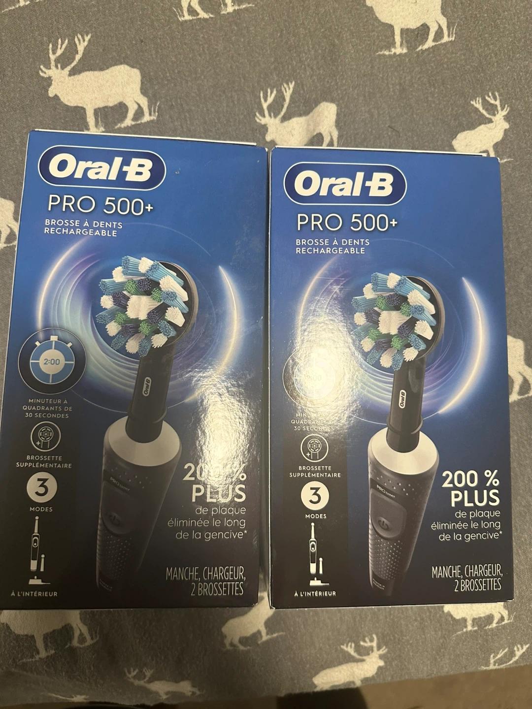 Two Oral-B Pro 500+ Rechargeable Electric Toothbrushes