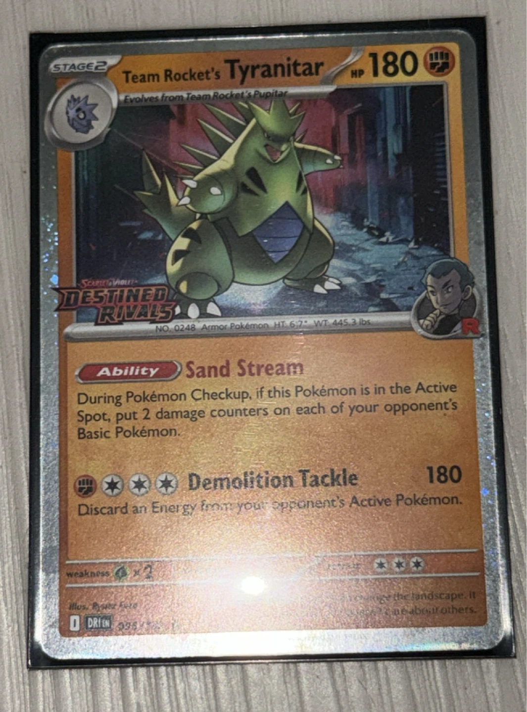 Team Rocket's Tyranitar prerelease Pokemon Card