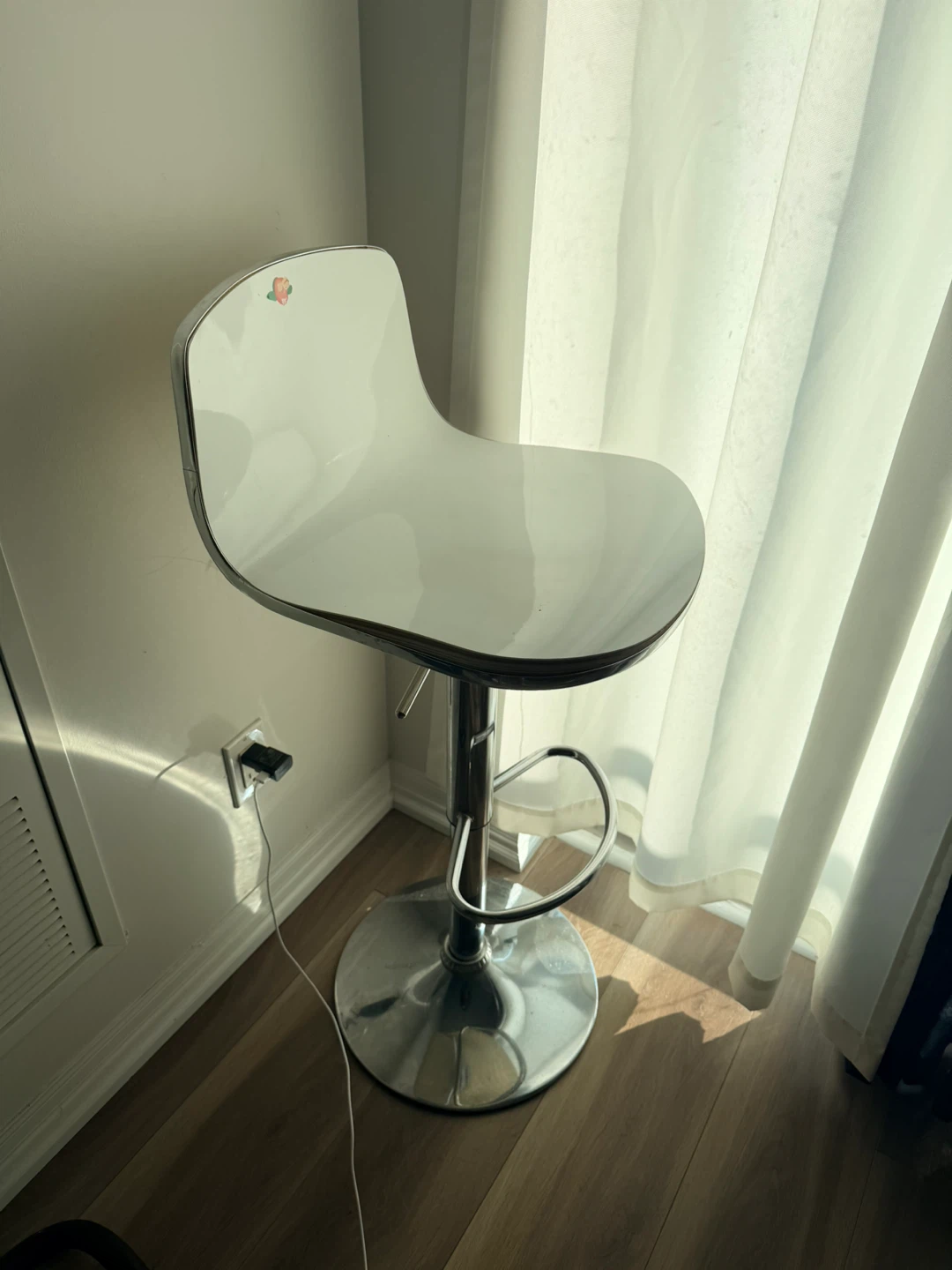 Modern white swivel bar stool