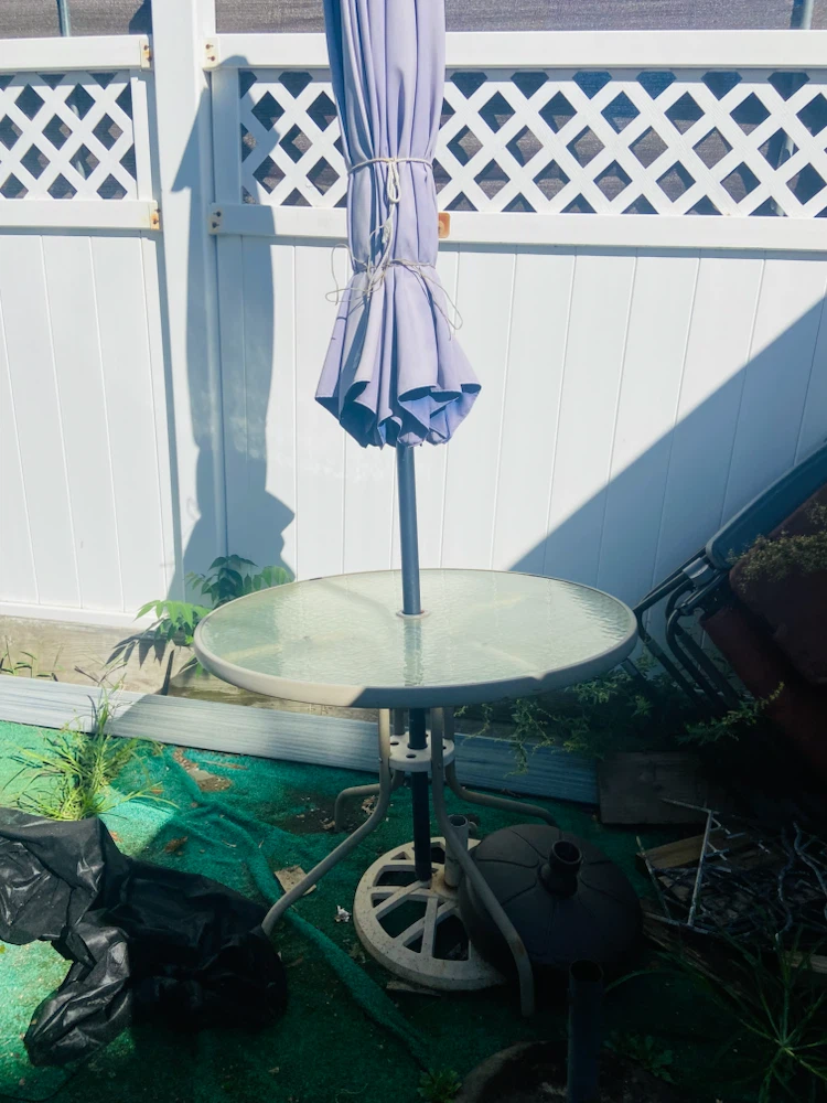 Round Glass Patio Table with Umbrella