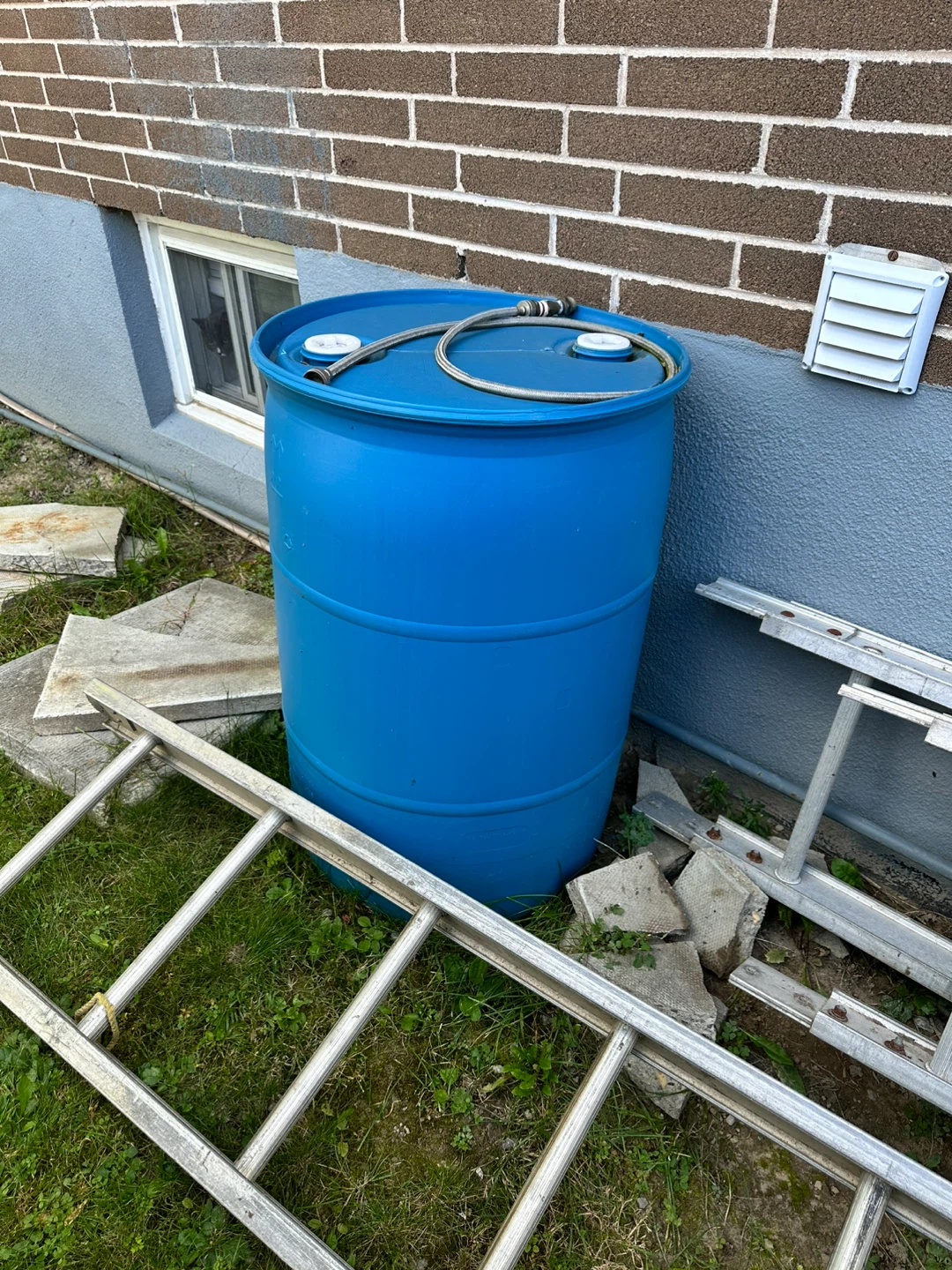 Blue Plastic Water Barrel
