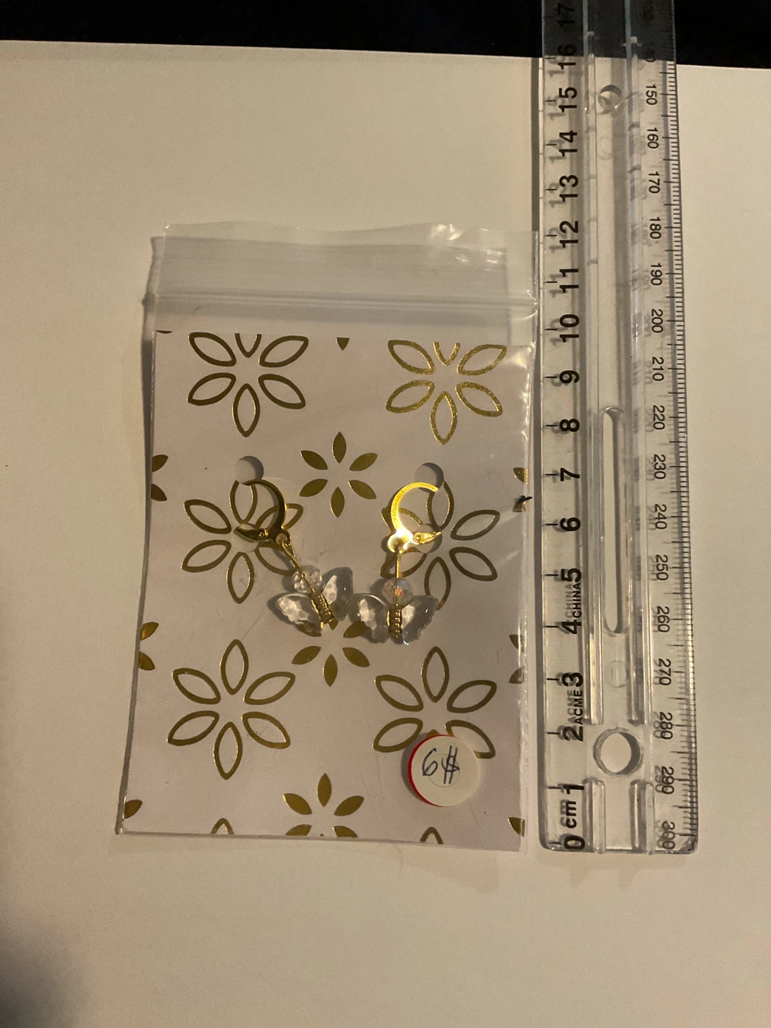 Gold-tone butterfly hoop earrings