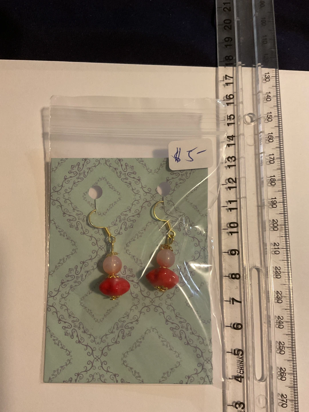 Pink and red beaded dangle earrings