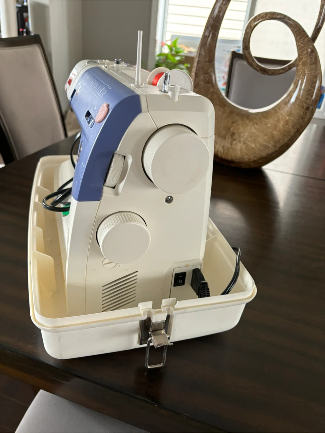 Sewing machine with hard case