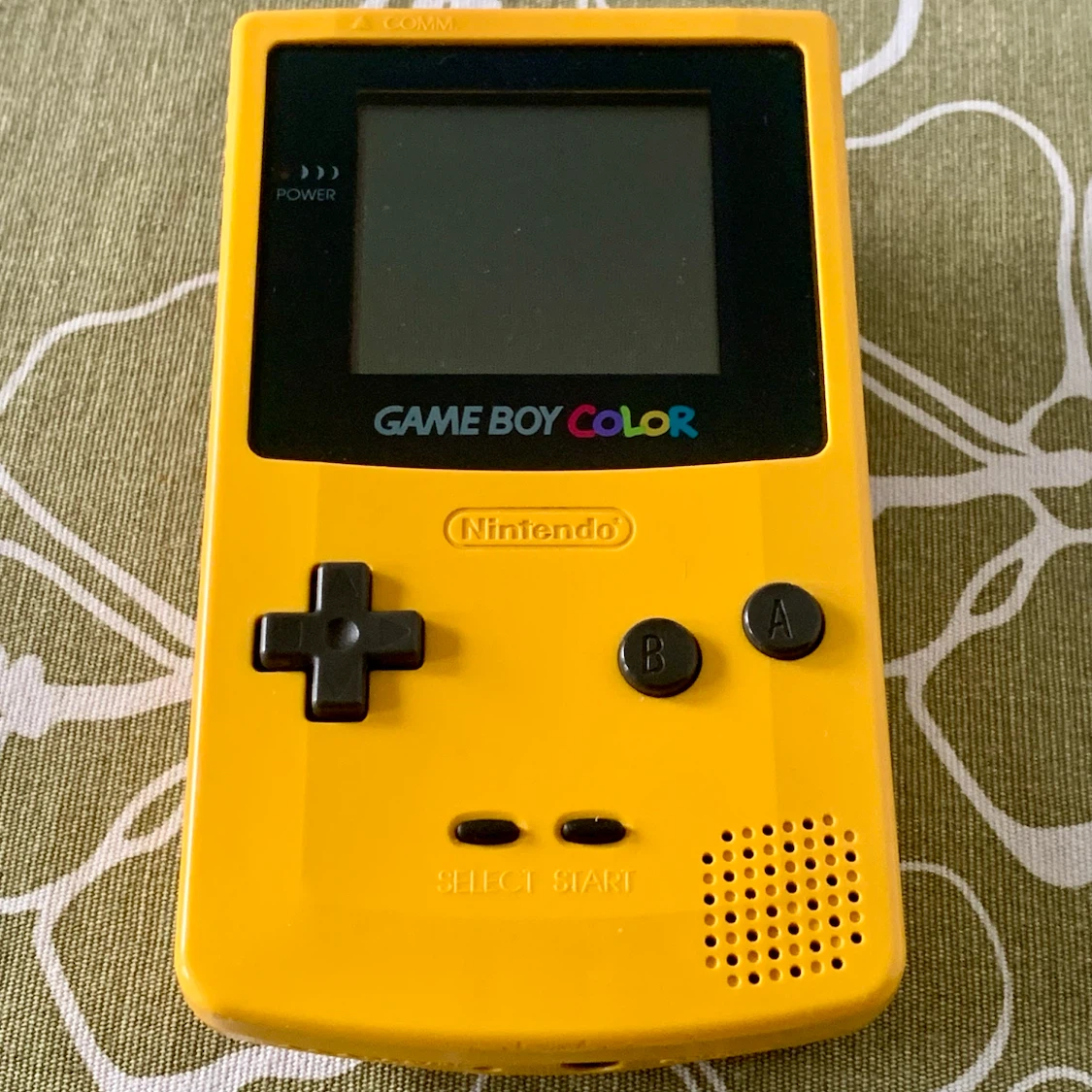 Yellow Nintendo Game Boy Color with Donkey Kong Country