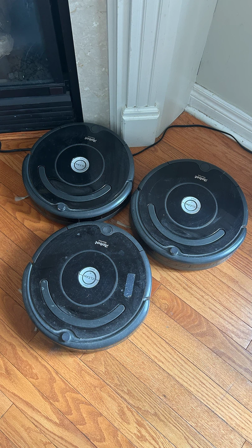 Three iRobot Roomba Robot Vacuums