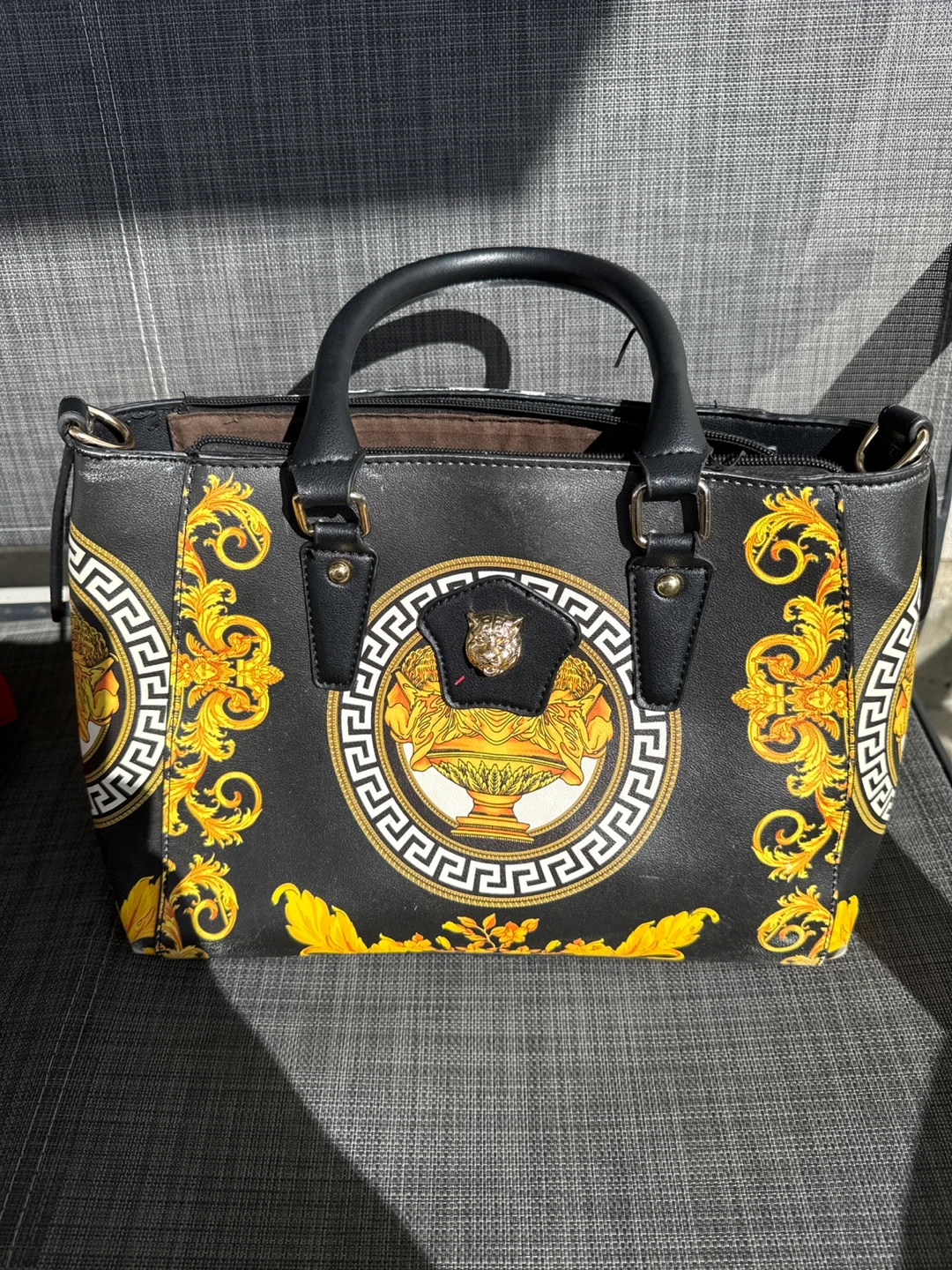 Black and gold purse
