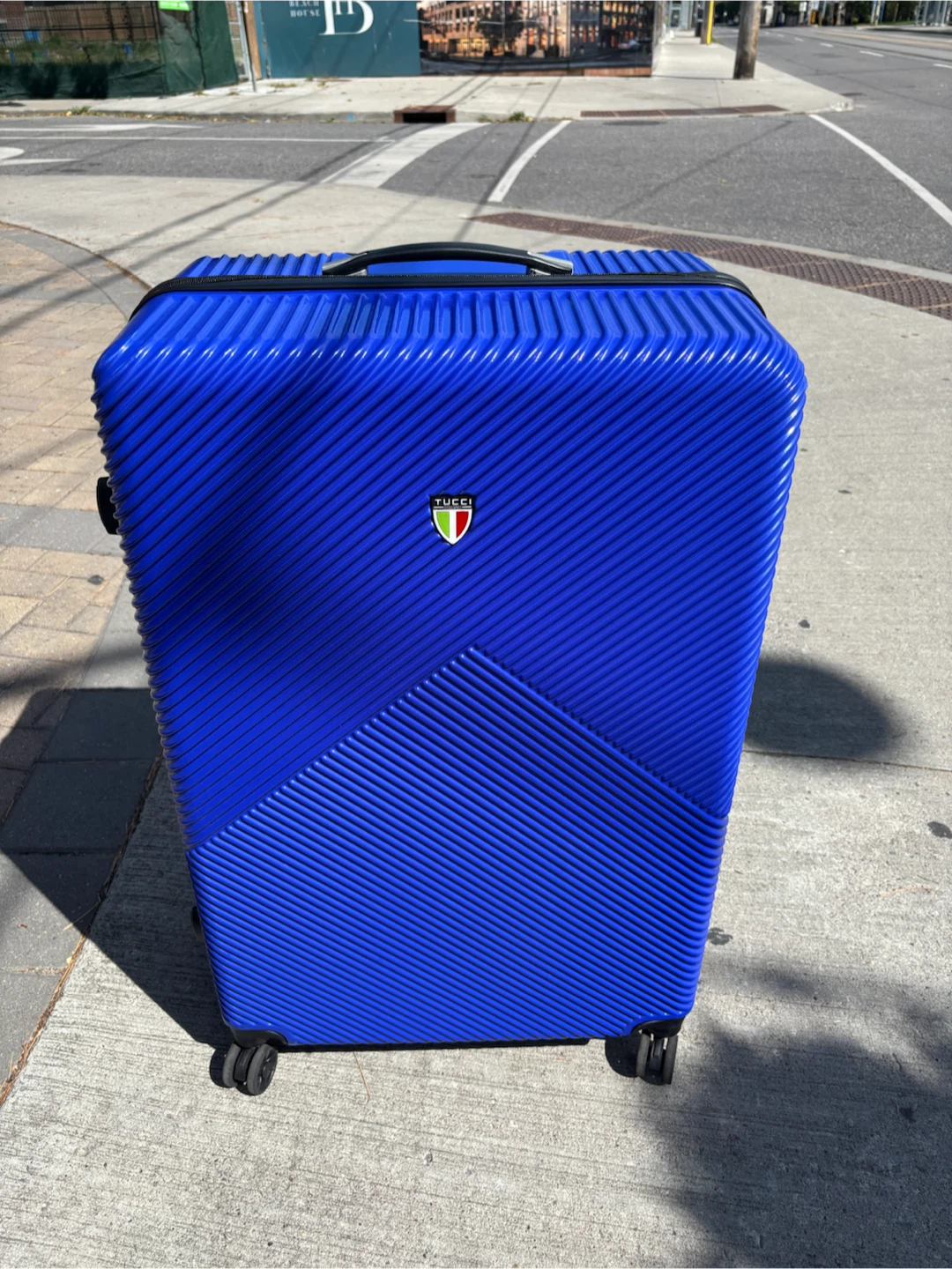Tucci hard-shell suitcase in royal blue