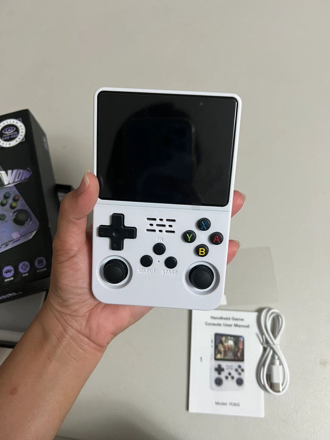 Brand New R36S Handheld Retro Game Console - photo 3