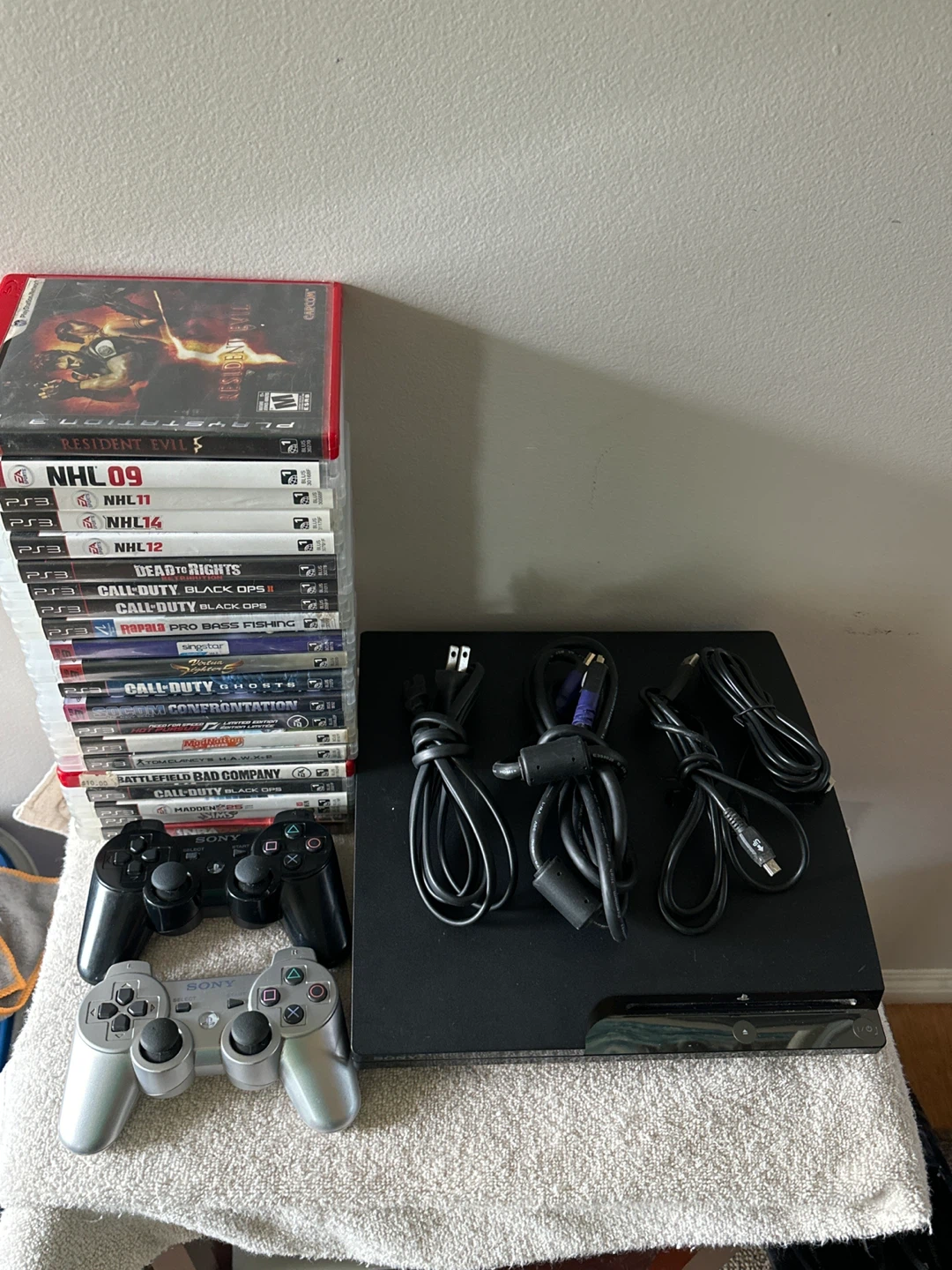 PlayStation 3 Console with 21 Games and 2 Controllers