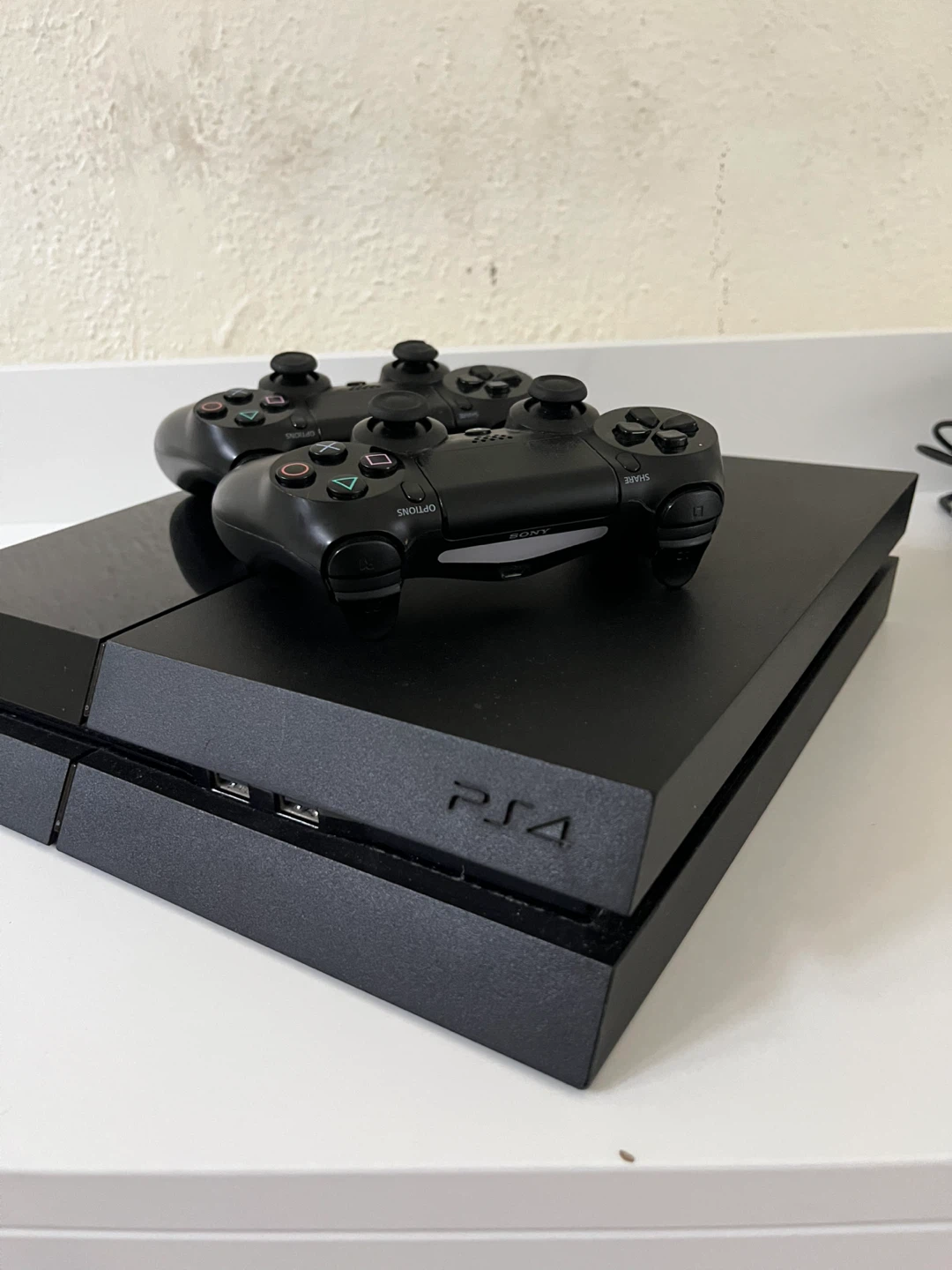 Sony PlayStation 4 Console with 2 Controllers