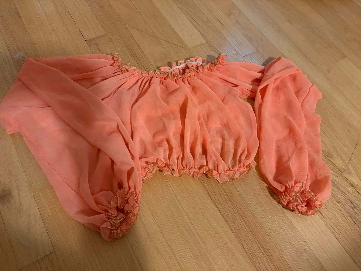 Peach off-the-shoulder chiffon top