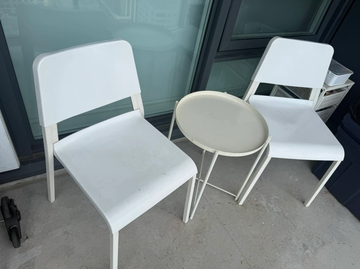 Two IKEA White Chairs