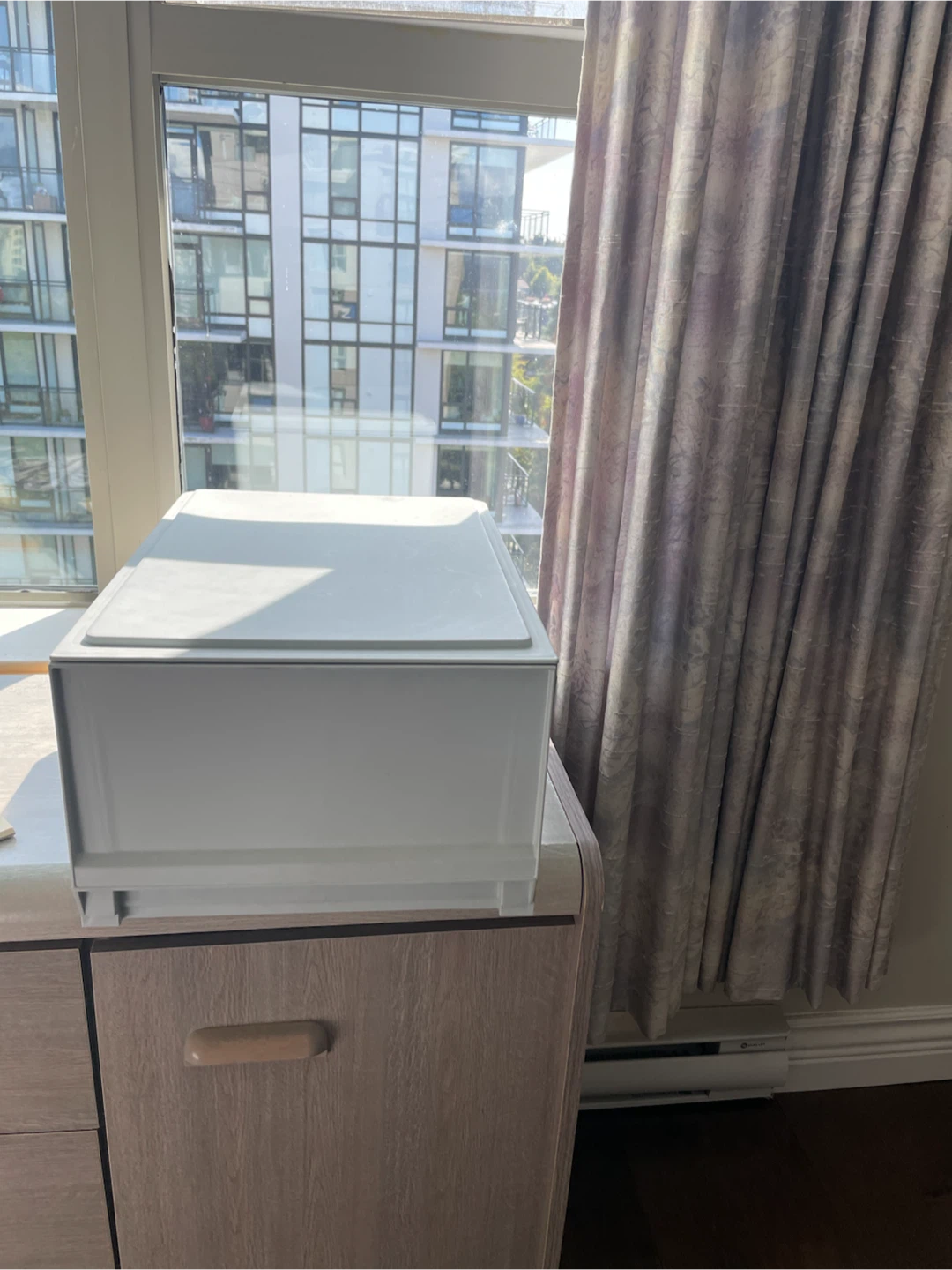 White plastic storage drawer