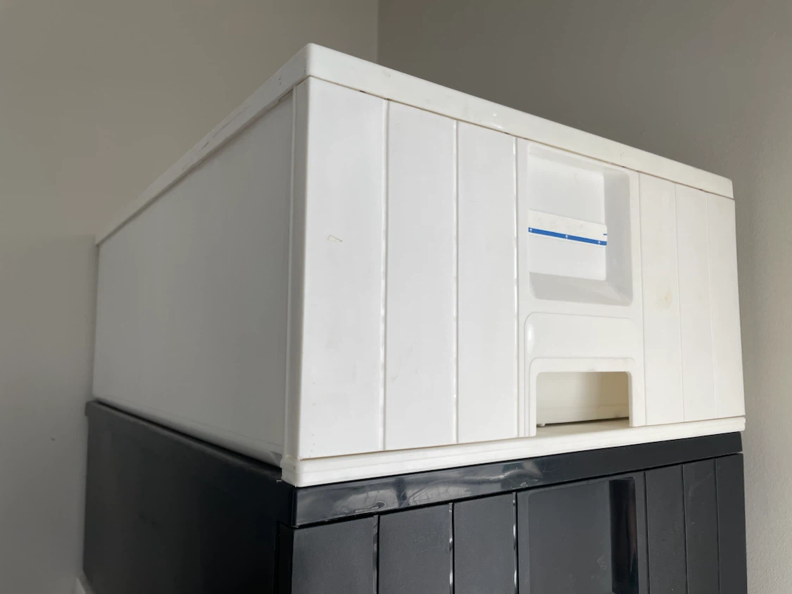 White plastic storage bin