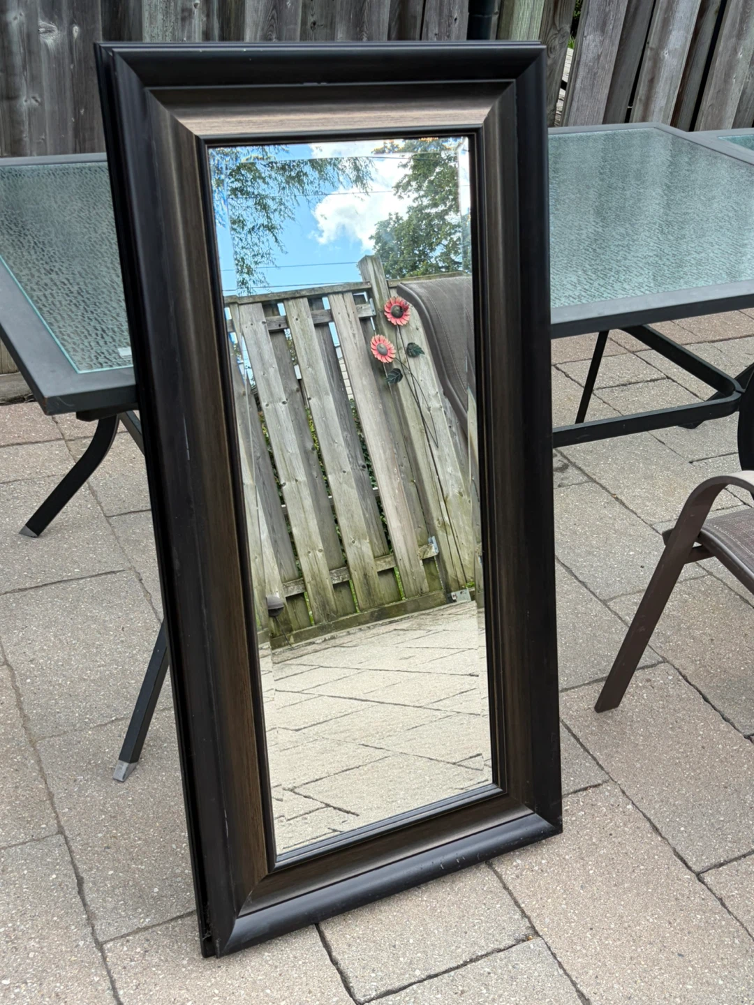 Wall mirror with dark wood-tone frame very little used !