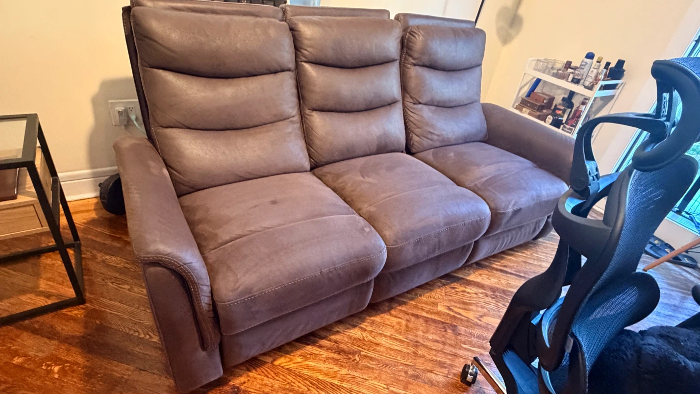 Brown Three-Seat Reclining Sofa with Center Console