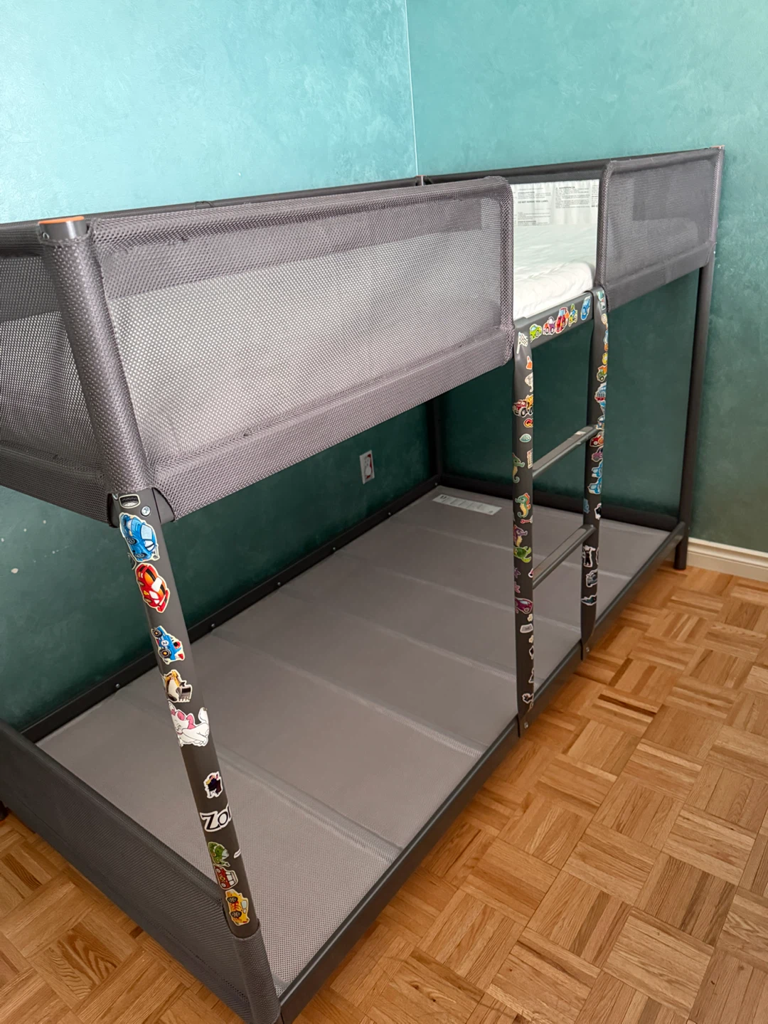 Kids grey bunk bed with mesh sides