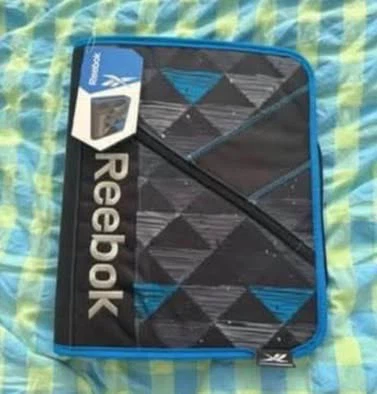 Reebok zipper binder (New)