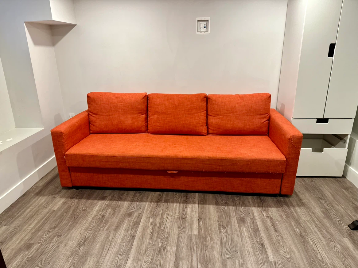 IKEA FRIHETEN Sofa Bed — Orange
