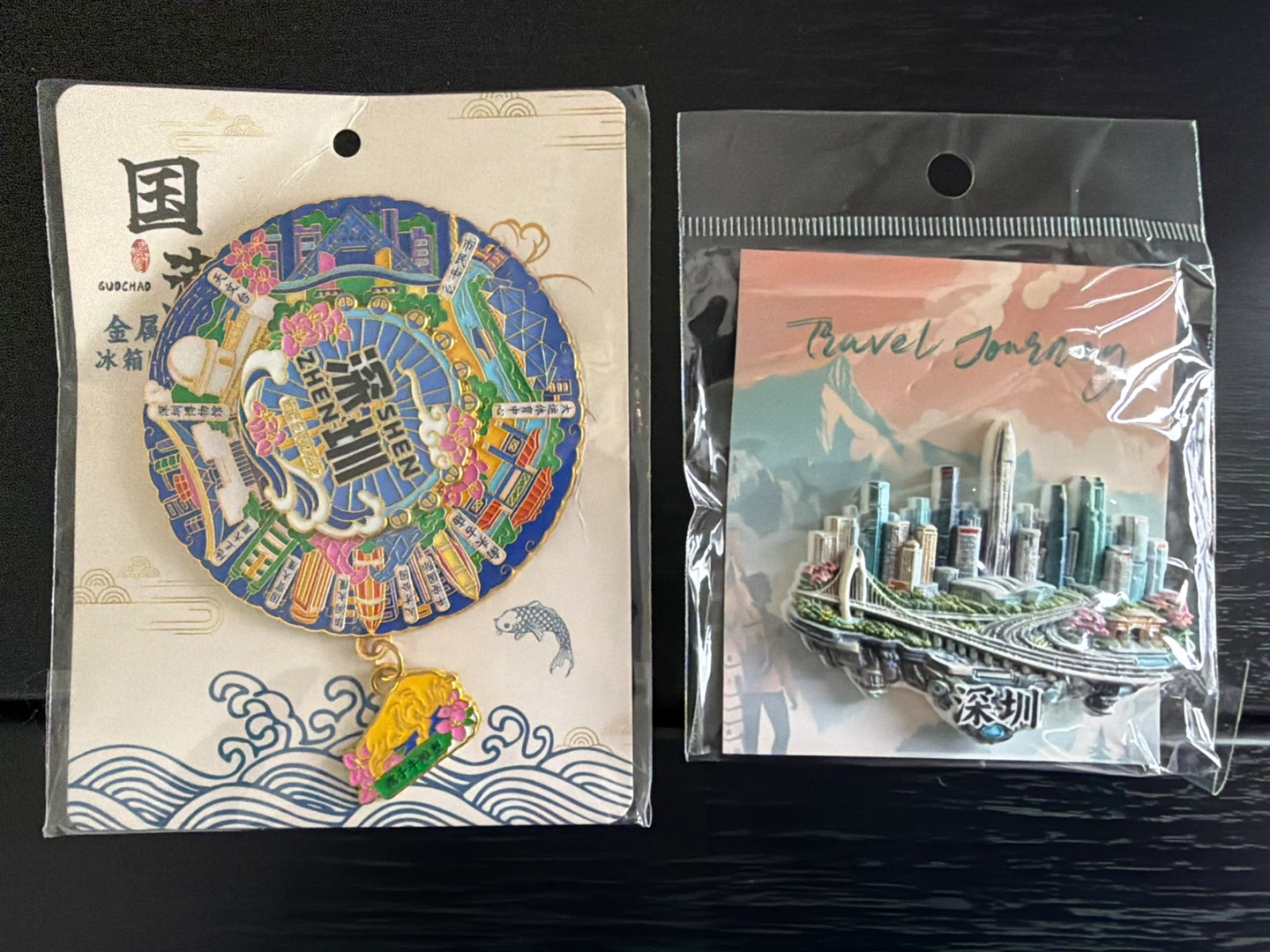 Two Shenzhen souvenir fridge magnets