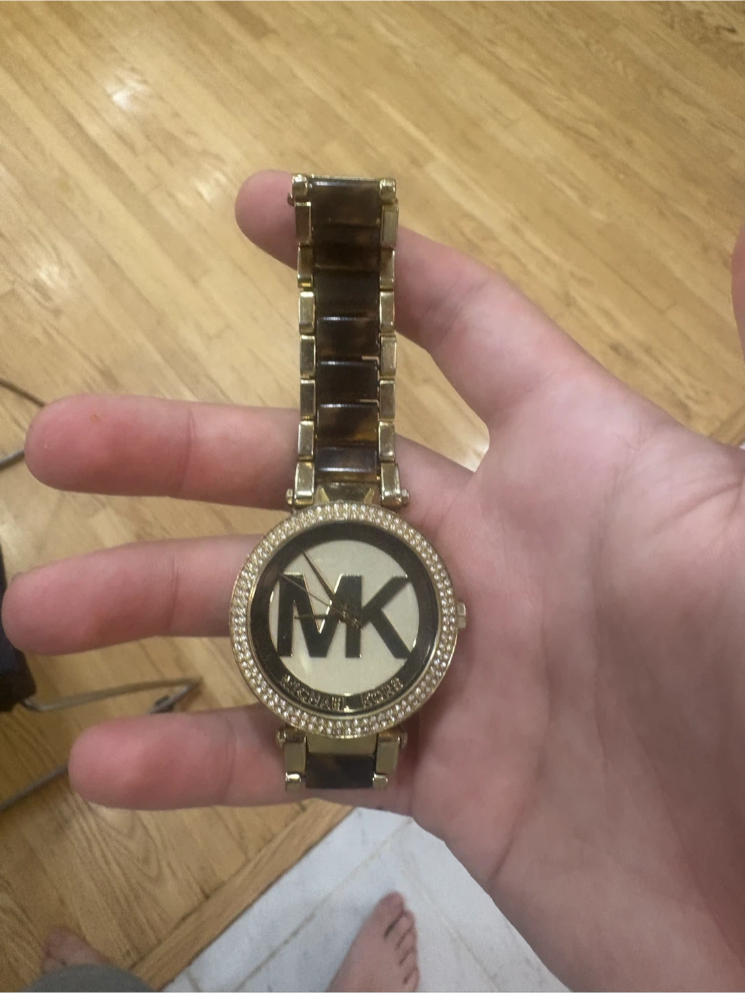 Michael Kors gold and tortoise shell watch with bezels
