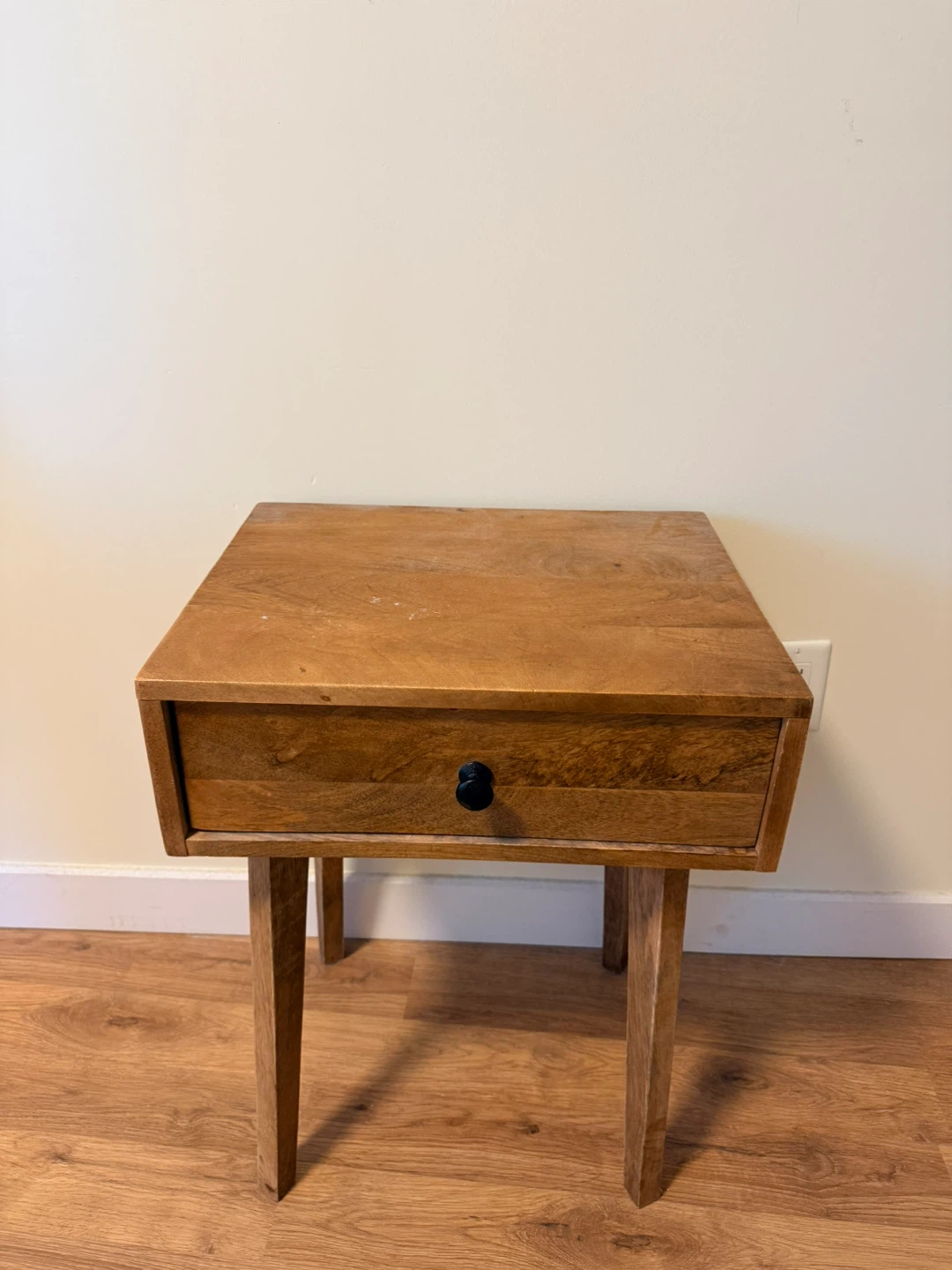 Wooden bedside table with drawer