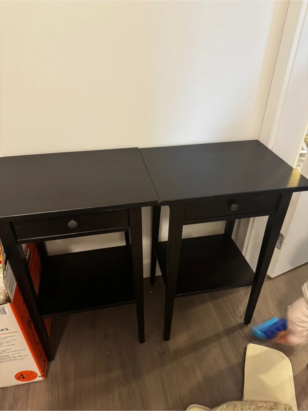 Two black side tables