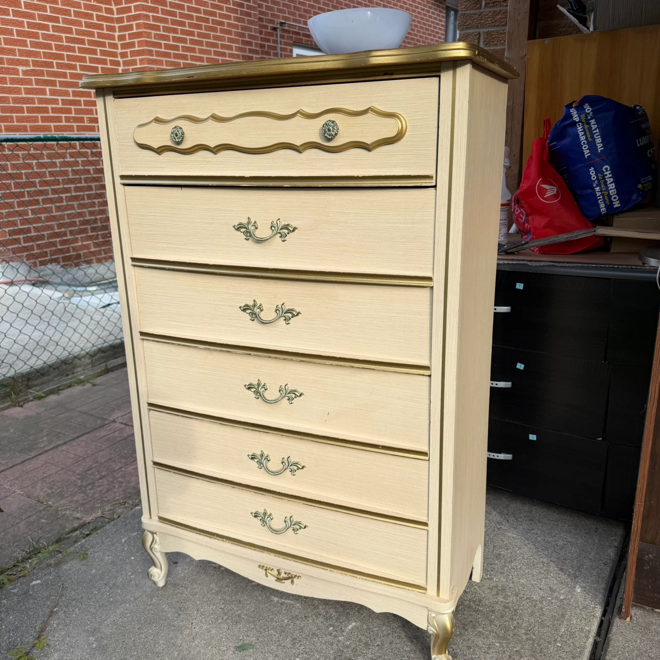 Cream and Gold Five-Drawer Dresser drawer needs track guide