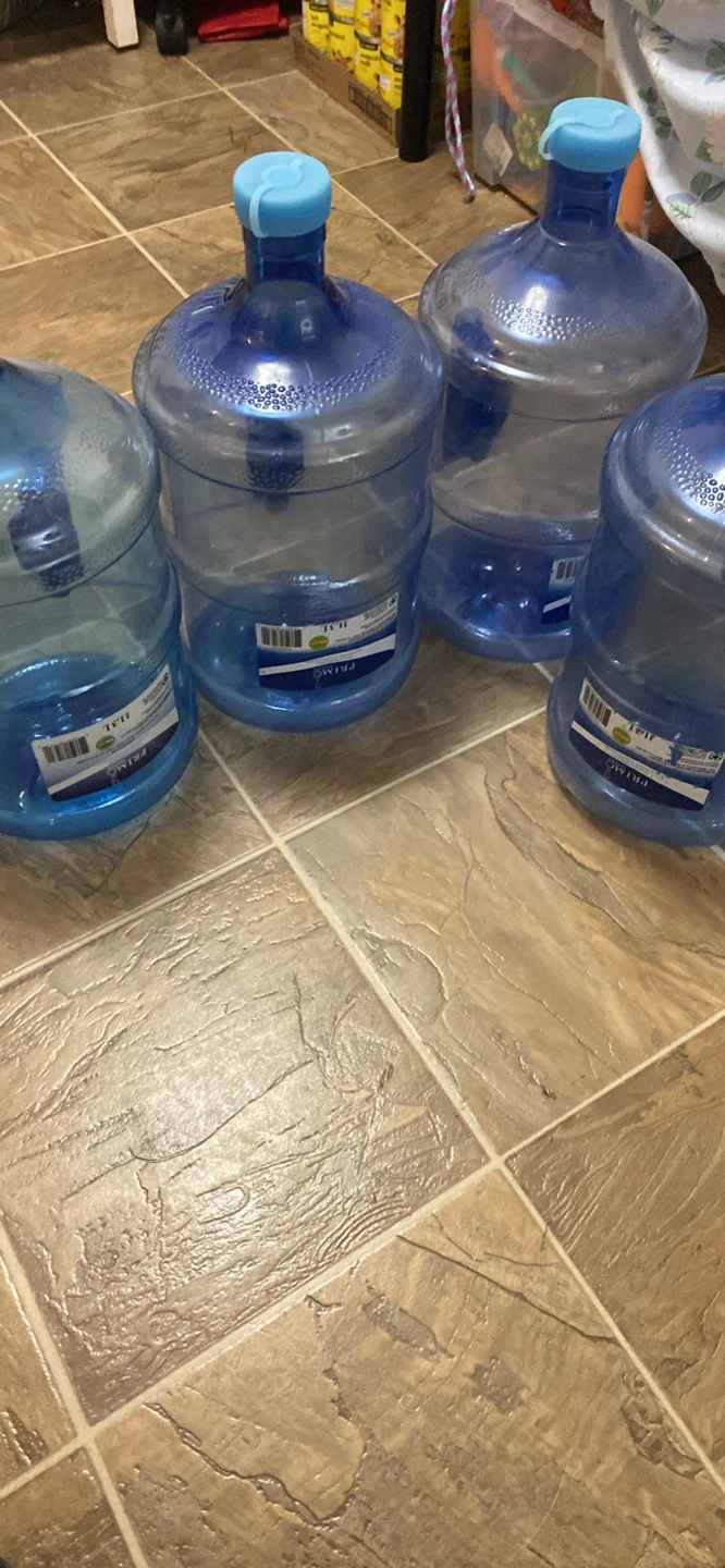 Four Primo Water Jugs