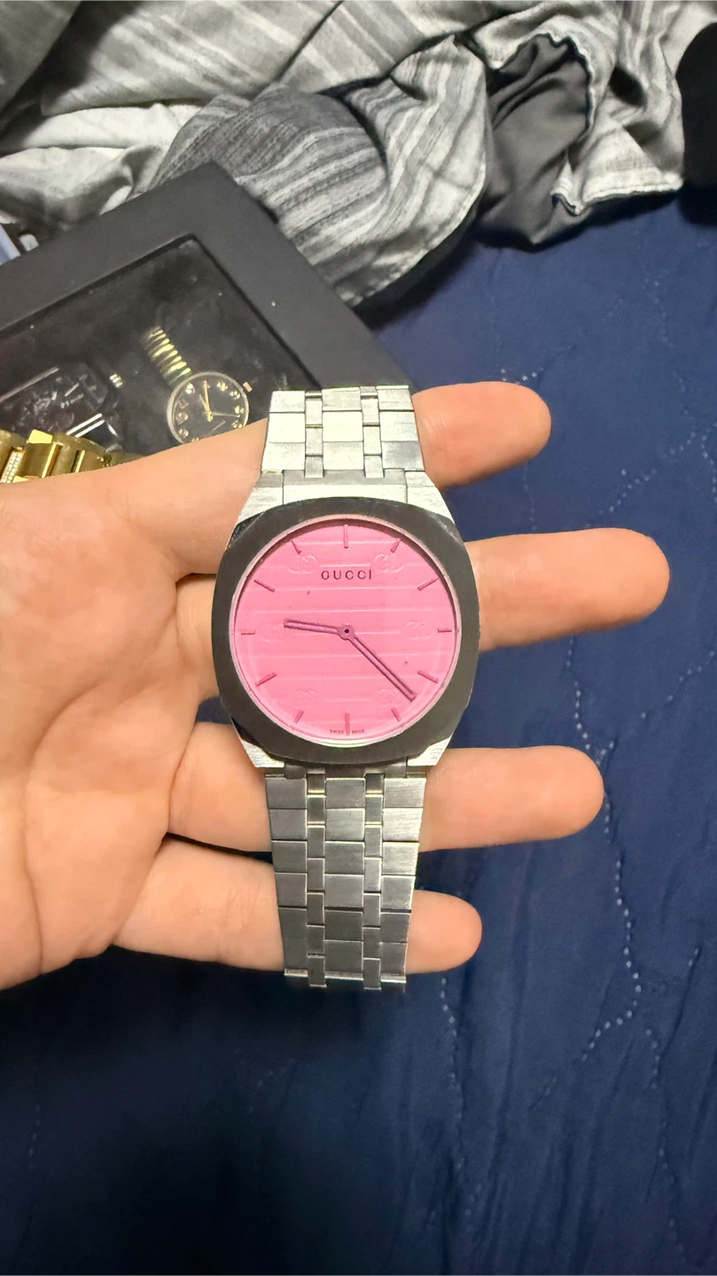 Gucci watch with pink face