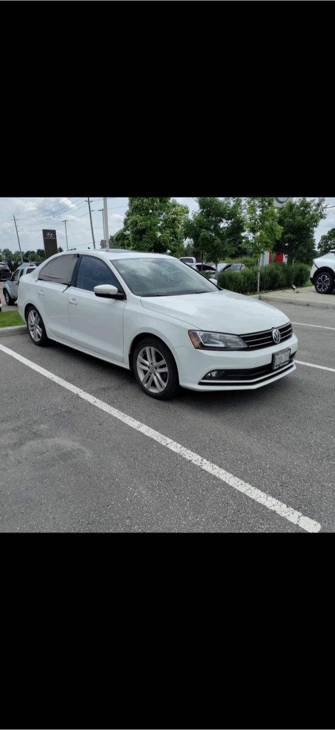White Volkswagen Jetta - photo 2