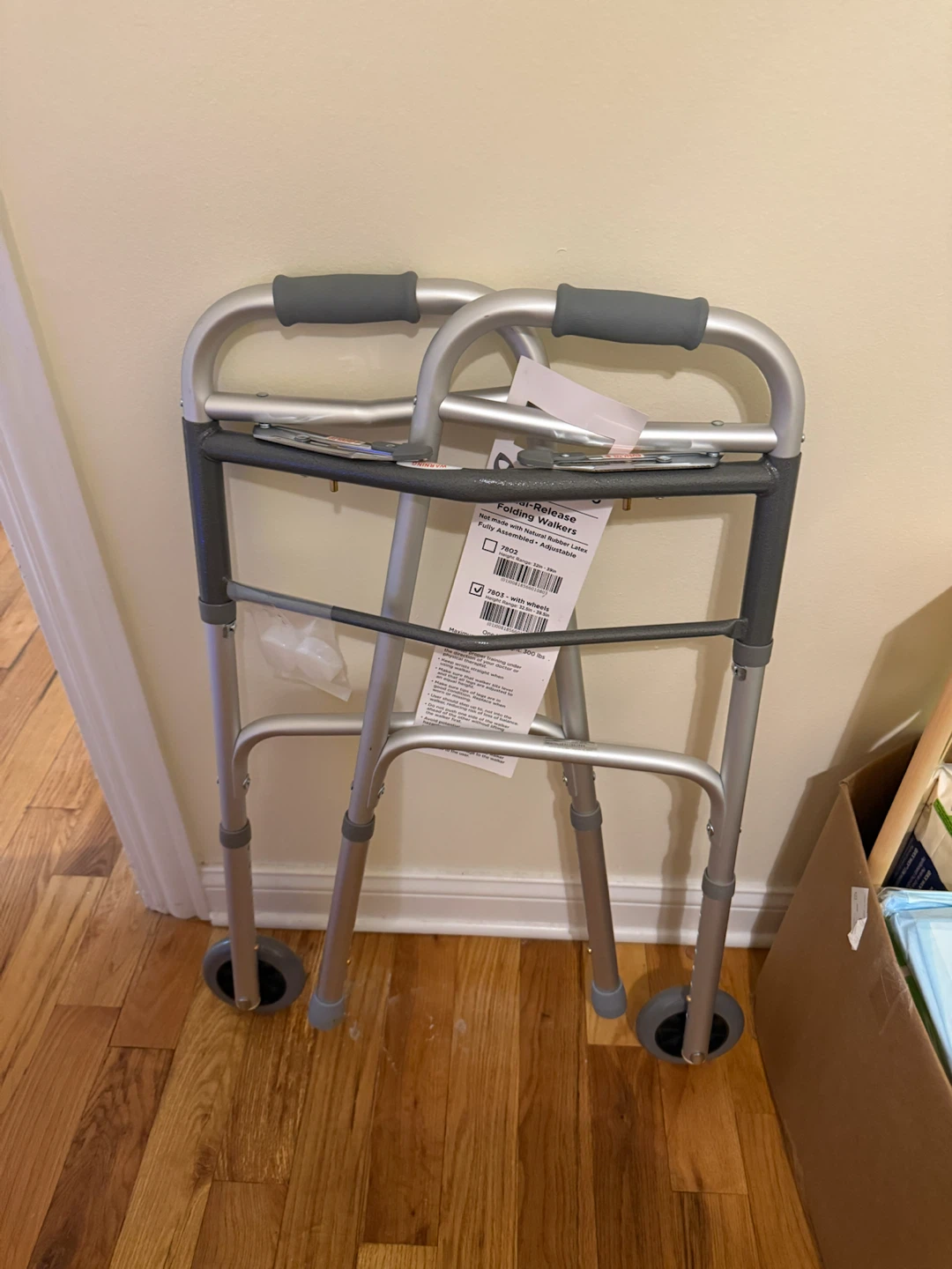 Dual-Release Folding Walker with Wheels