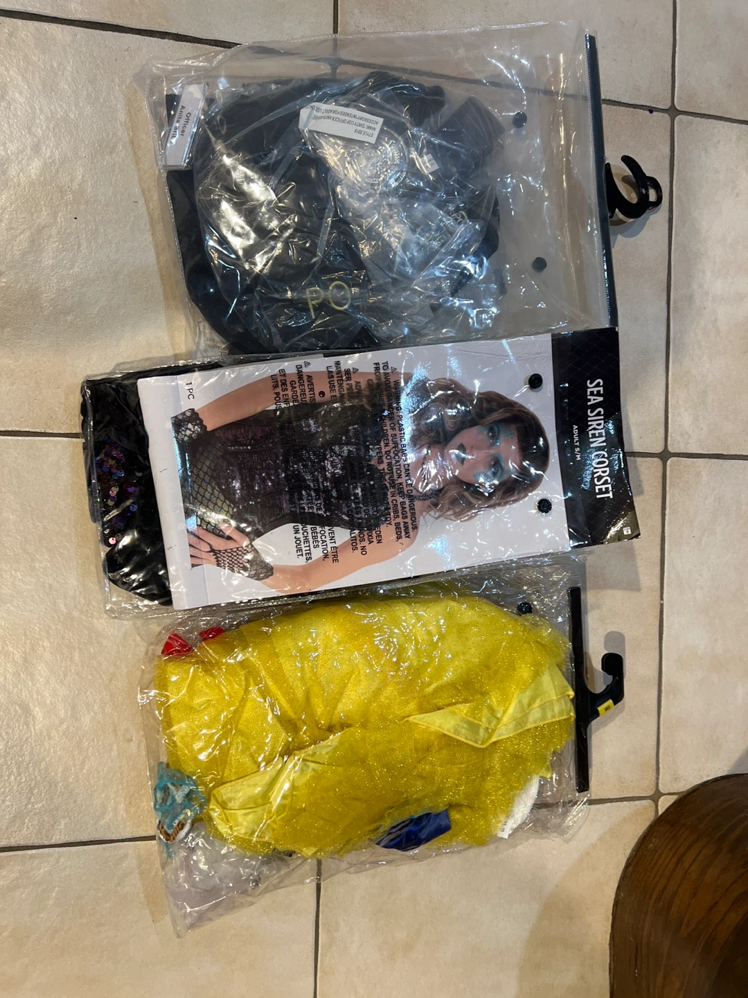 Three Costumes: Sea Siren, Officer, and Yellow Dress