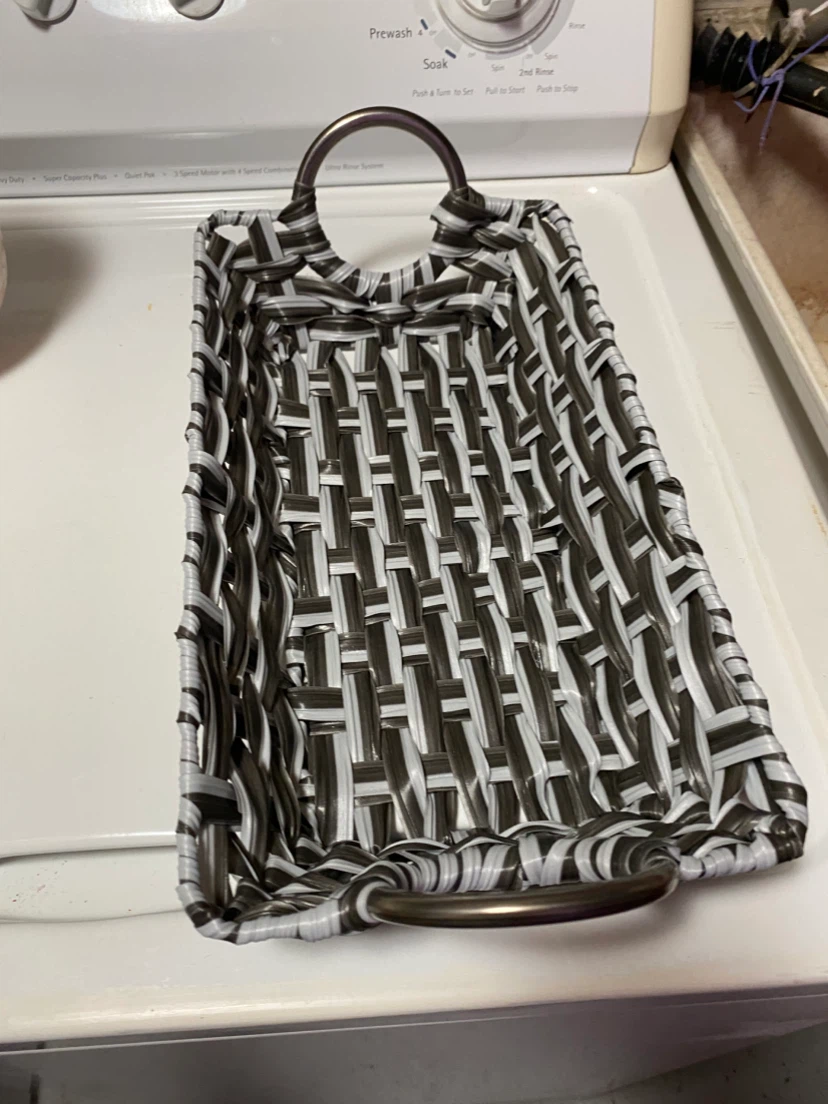 Woven storage basket with handles