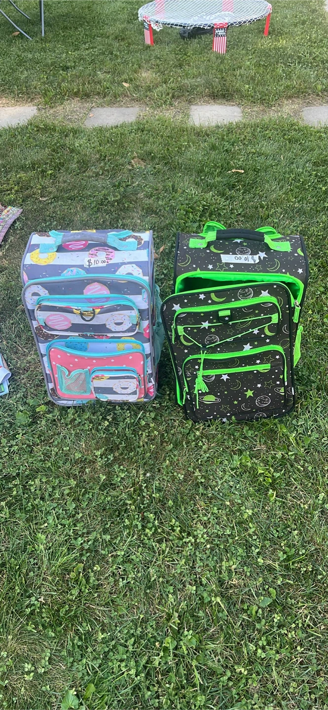 Two Kids Rolling Luggage