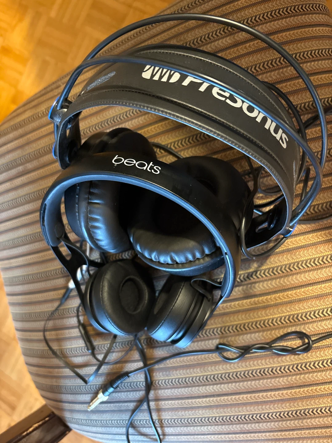 Two pairs of over-ear headphones