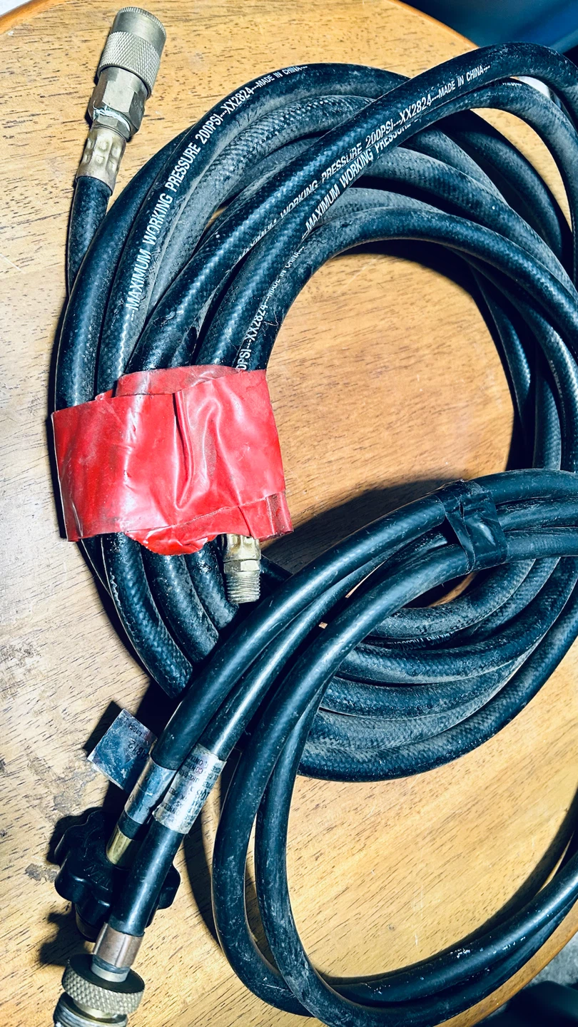 Heavy-duty hoses with fittings. Rated up to 200 PSI.