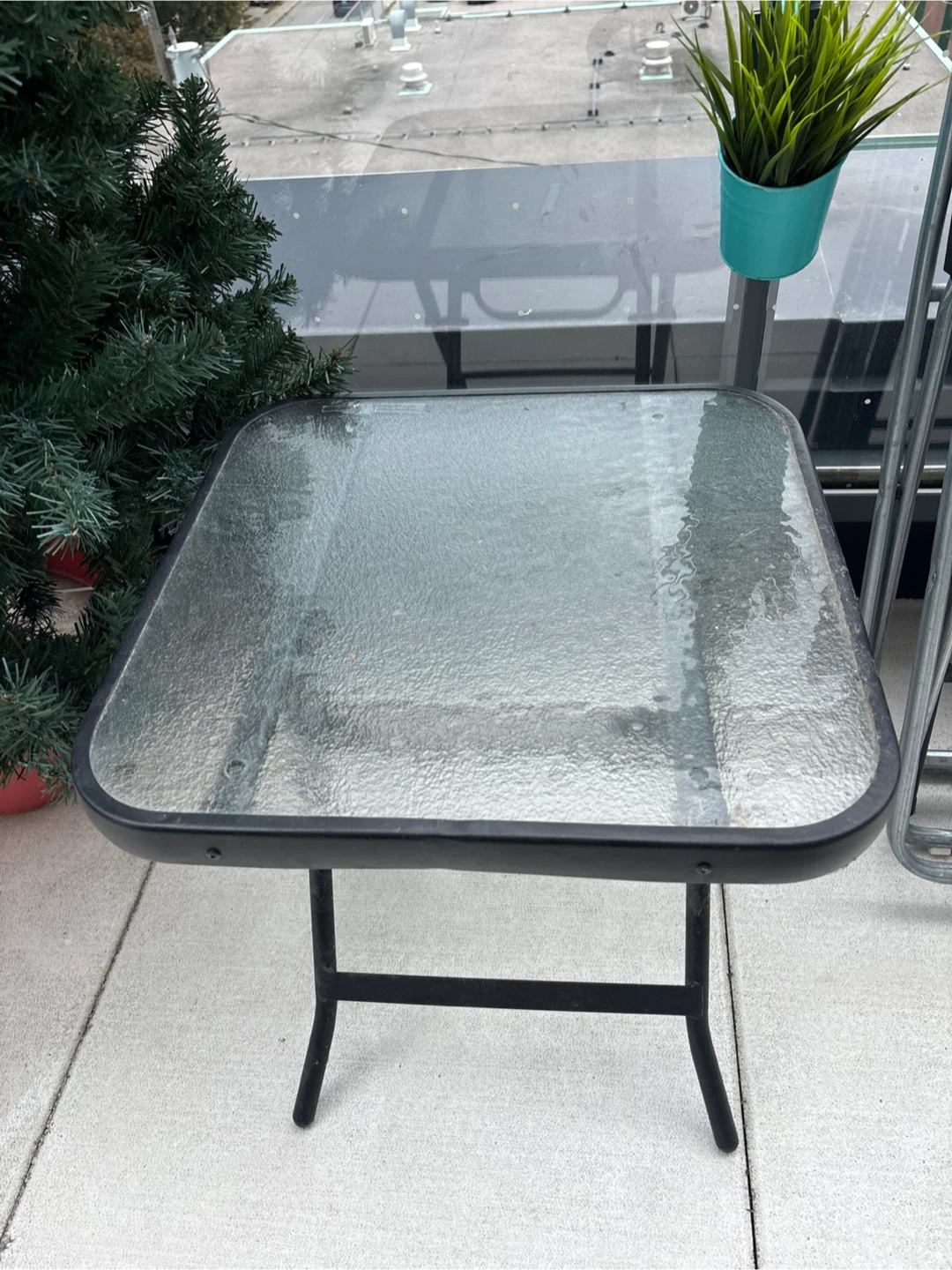 Folding glass top side table